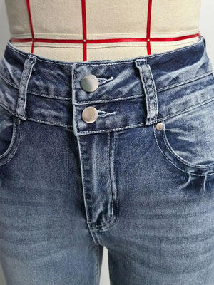Classic high-waisted flare jeans in blue denim with a double button closure and whiskering detail.