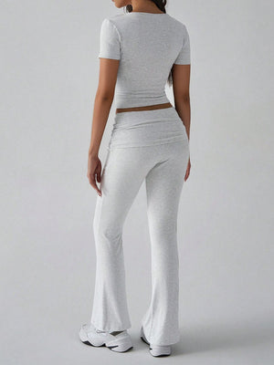 Light gray ribbed flare leg lounge pants with ruched waist detail.