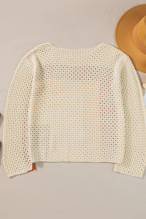 Beige crochet knit sweater with an ombre effect and open knit panels.