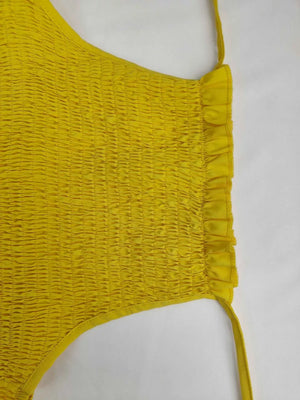 Yellow smocked maxi dress with ruffle trim and thin straps