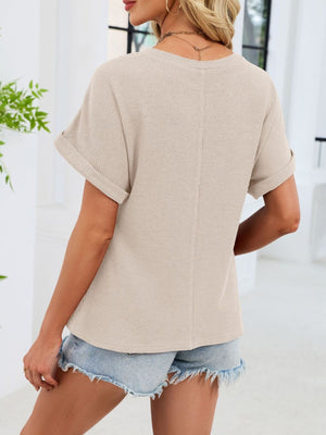 Apricot waffle knit t-shirt with cuffed short sleeves and a relaxed fit.