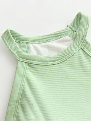 Ribbed halter crop top in Gum Leaf green with contrast stitching detail.