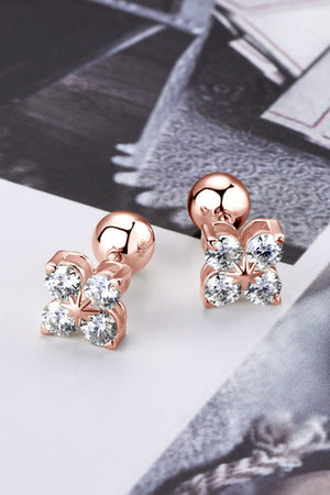 Rose gold stud earrings with four clear stones in a clover design
