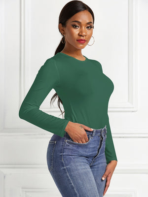 Dark Green ribbed jersey bodysuit with long sleeves and a crew neck, paired with blue jeans.
