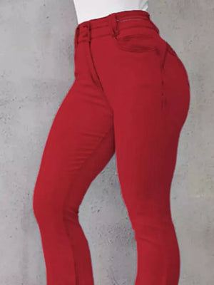 Red high-waisted flare jeans with buttoned closure and cotton spandex material.