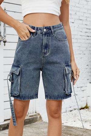Medium blue denim cargo shorts with straps on the pockets.
