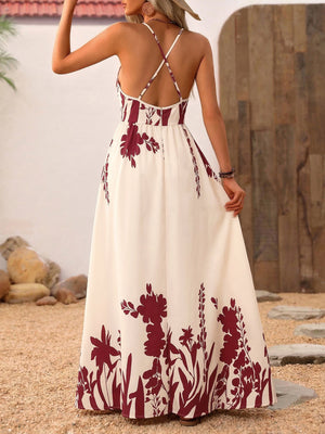 Floral maxi dress with deep V-neck and criss-cross straps, a-line cut, cream with burgundy floral print.