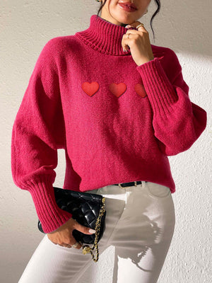 Deep Red turtleneck sweater with balloon sleeves and heart appliqués.