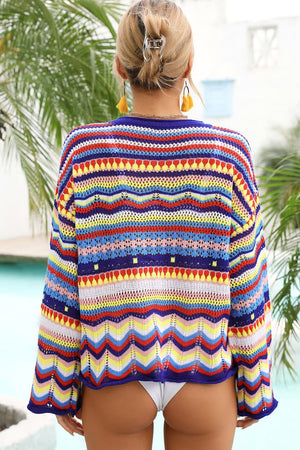 Multicolor knit cover-up with crochet wave pattern and open knit details.