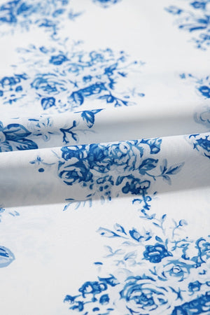Toile print asymmetric ruffle skirt in light blue with a floral pattern.