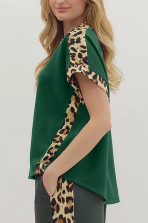 Green polyester tee with relaxed fit and leopard print accents on sleeves and sides.