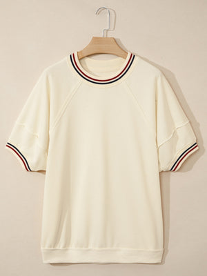 Cream cotton tunic top with striped neckline and sleeve cuffs