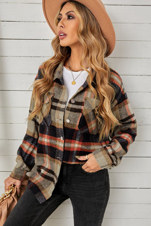 Relaxed plaid shacket with patch pockets in blue/orange and khaki tones.