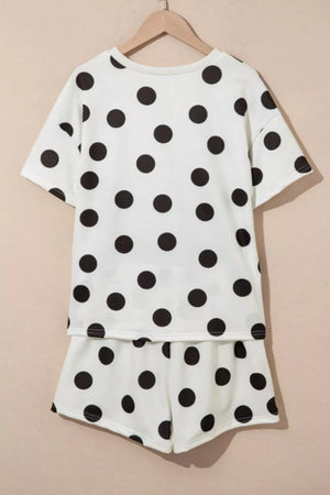 White polka dot loungewear set with crew neck top and shorts.