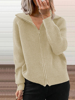 Khaki ribbed knit zip-front trench coat with collar and pockets.