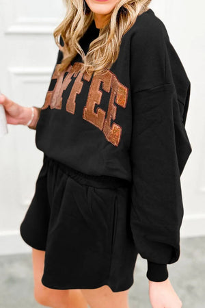 Black loungewear set with sequin coffee graphic on sweatshirt and elastic waist shorts.