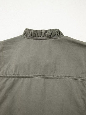 Ruffled collar denim vest in olive green cotton with button closure detail