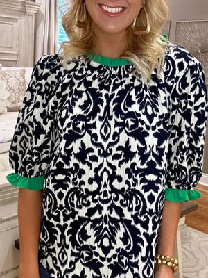 Maternity damask print blouse with green ruffled neckline and cuffs, half sleeves.