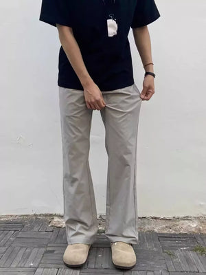 Men's light gray sweatpants with a relaxed fit and subtle seam detail.