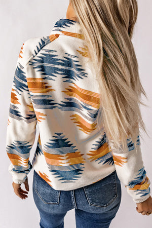 Navajo fleece snap-front jacket in multicolor with geometric pattern.