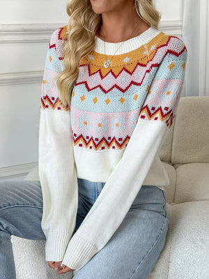 Geometric knit long-sleeve sweater in white with colorful fair isle pattern and crew neck.