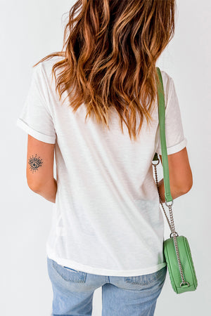 White casual tee with rolled sleeves and a black eye tattoo on the arm.