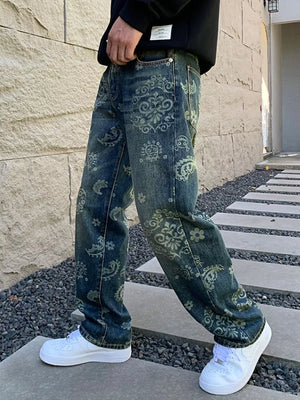 Men's heritage-inspired floral print denim jeans with a vintage wash.