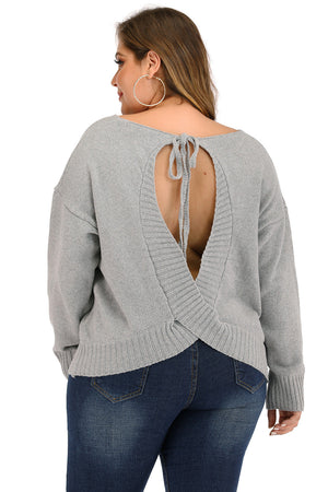 Grey knit sweater with open back and tie detail, crew neck, long sleeves.