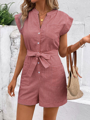 Dusty pink striped shirtdress romper with tie waist and cap sleeves.