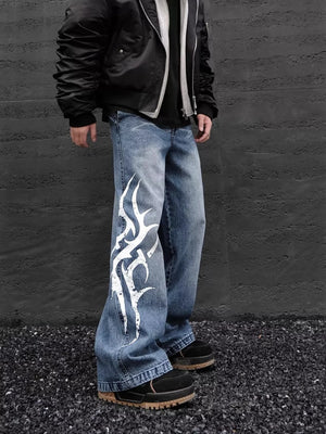 Men's blue denim wide leg jeans with tribal print detail