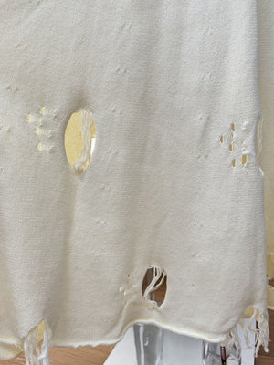 Off white distressed cotton sweater set with deconstructed details and frayed hem