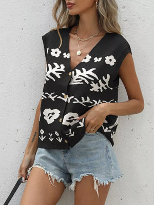 Black floral V-neck button-down cardigan vest with gold buttons.