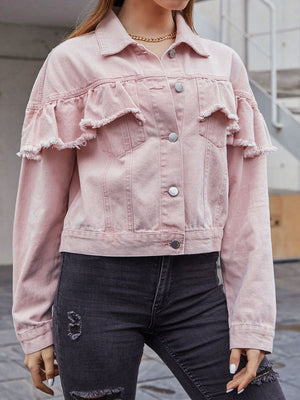 Blush pink denim trucker jacket with frayed ruffle details on the shoulders and sleeves.