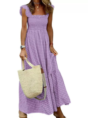 Purple gingham ruffled maxi dress with smocked bodice and square neckline.