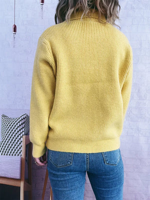 Yellow ribbed knit cardigan with polo collar and button-up front, styled with jeans.