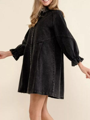 Black denim button-down dress with ruffled cuffs and balloon sleeves.