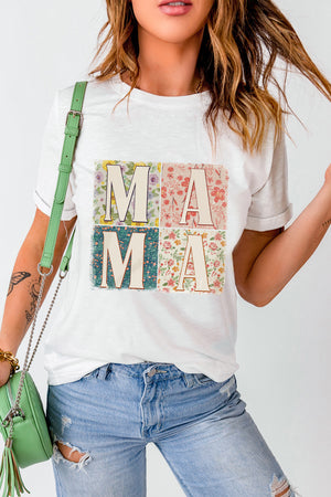 White t-shirt with floral collage "MAMA" graphic, short sleeves, crew neck.