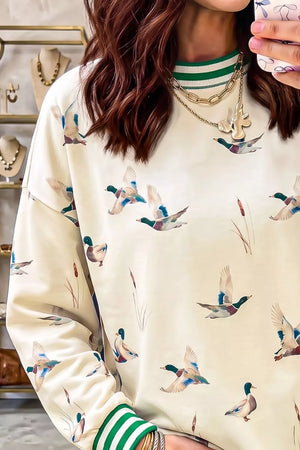 Whimsical Duck Print Sweatshirt in Beige, close-up detail