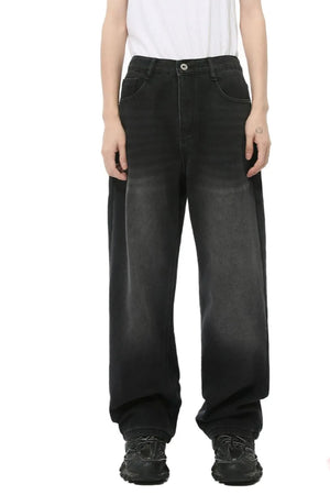 Black wide-leg denim jeans with a relaxed, baggy fit and gradient wash.