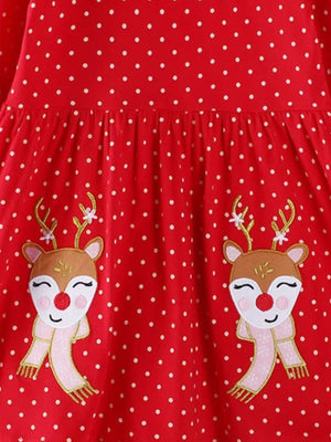 Red polka dot baby dress with cute reindeer applique and ruffled waist.