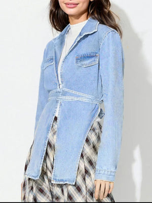Medium wash denim wrap coat with asymmetric hem and tie waist detail.