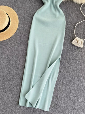 Light blue ribbed knit midi dress with a high slit and cutout back detail.