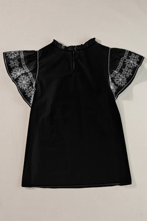 Black embroidered sleeve ruffle neck blouse