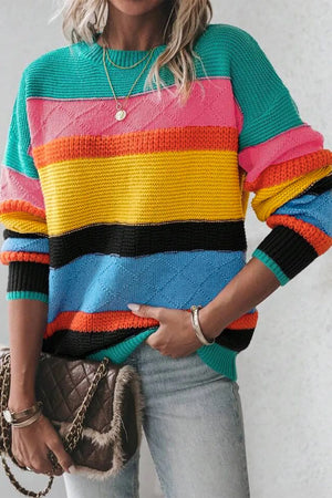 Rainbow stripe knit crewneck sweater with diamond pattern detail in turquoise and pastel blue.