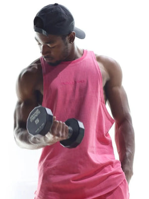 Muscle Armed tank top in fuchsia pink, washed cotton blend, with embroidered logo detail.