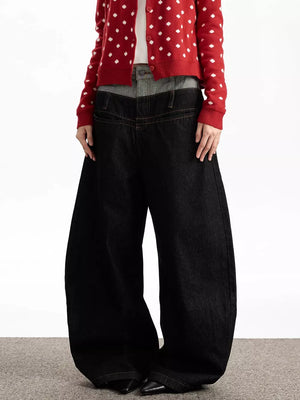 Layered double waist wide leg jeans in dark wash cotton, featuring a relaxed fit and contrast stitching.