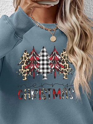 Crewneck sweatshirt in Misty Blue with Christmas trees graphic featuring buffalo plaid and leopard print.