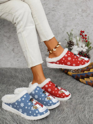 Snowman print sherpa lined holiday slides in red and blue with white snowflakes.