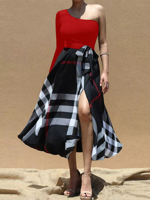 Red one-shoulder midi dress with a black plaid wrap skirt and waist tie.