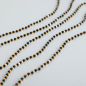 Black onyx and gold bead necklace with 18K gold accents.